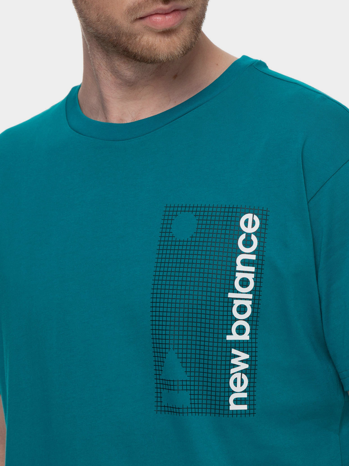 Футболки и поло New Balance Essentials Teerain модель MT03553TMT Футболки и поло New Balance Essentials Teerain модель MT03553TMT Фото