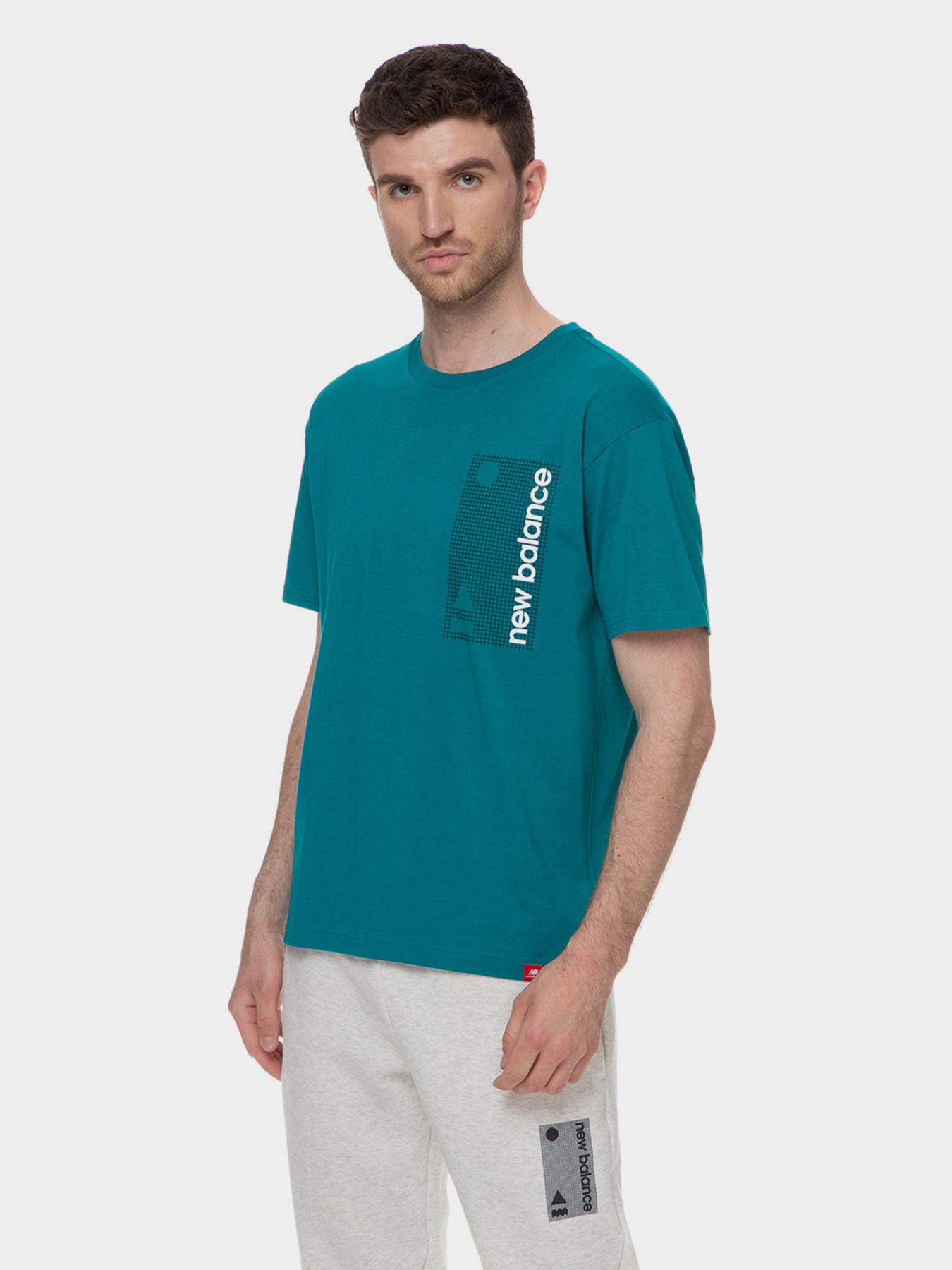 Футболки и поло New Balance Essentials Teerain модель MT03553TMT Футболки и поло New Balance Essentials Teerain модель MT03553TMT Фото