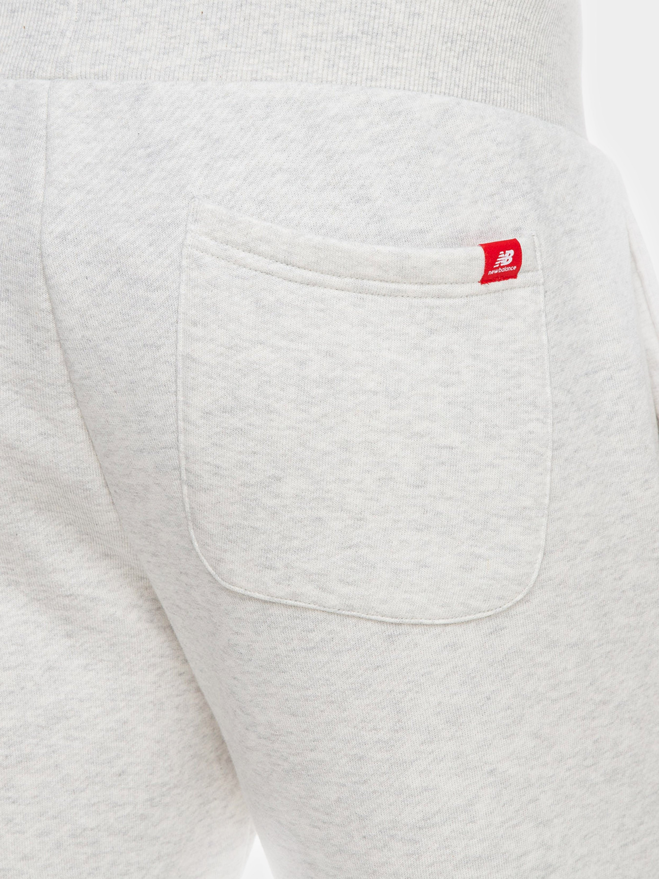 Штаны спортивные New Balance  ESSENTIALS TERRAIN модель MP03521SAH Фото