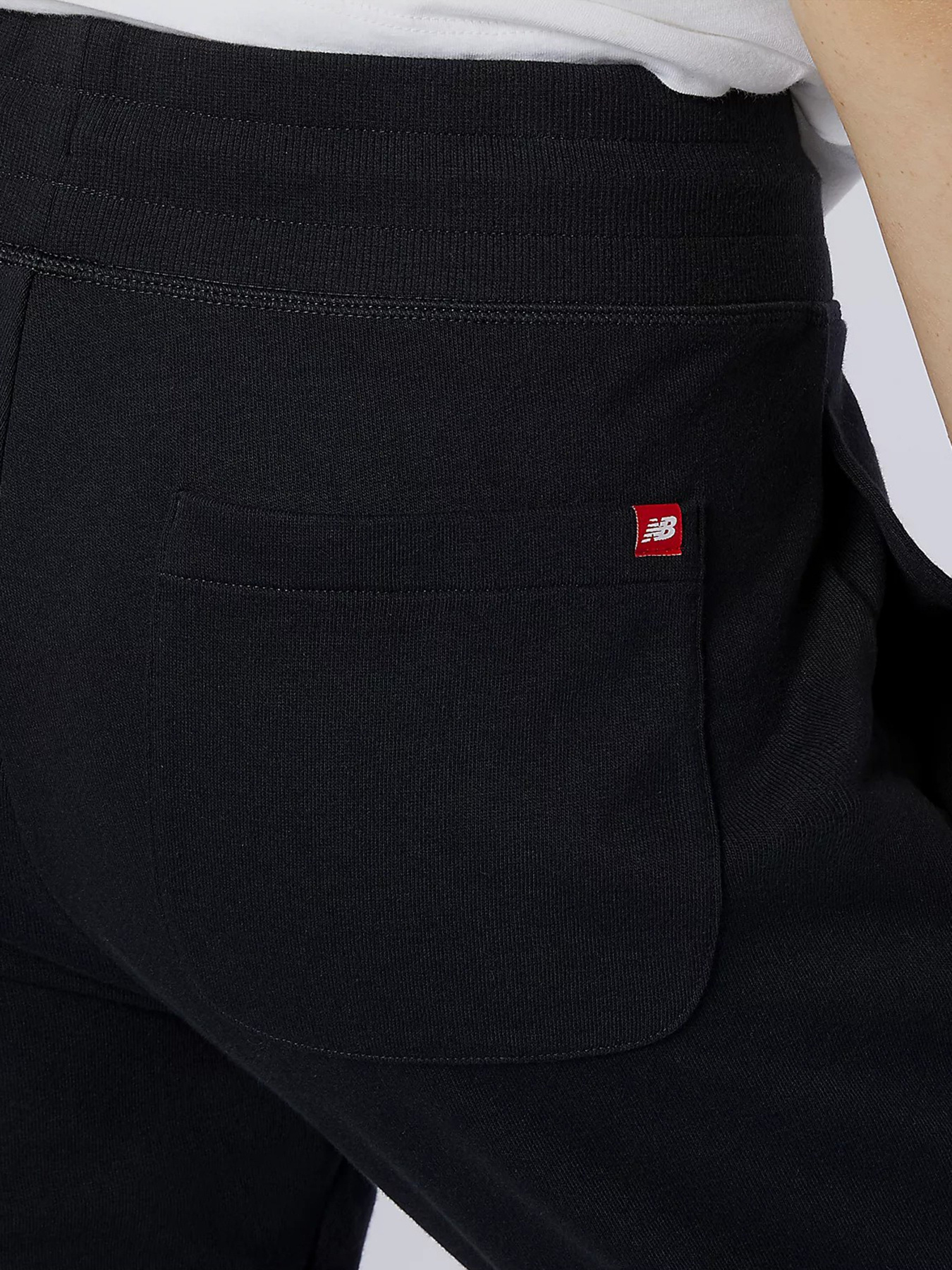 Штаны спортивные New Balance Essential Stack Logo модель MP11507BK Фото