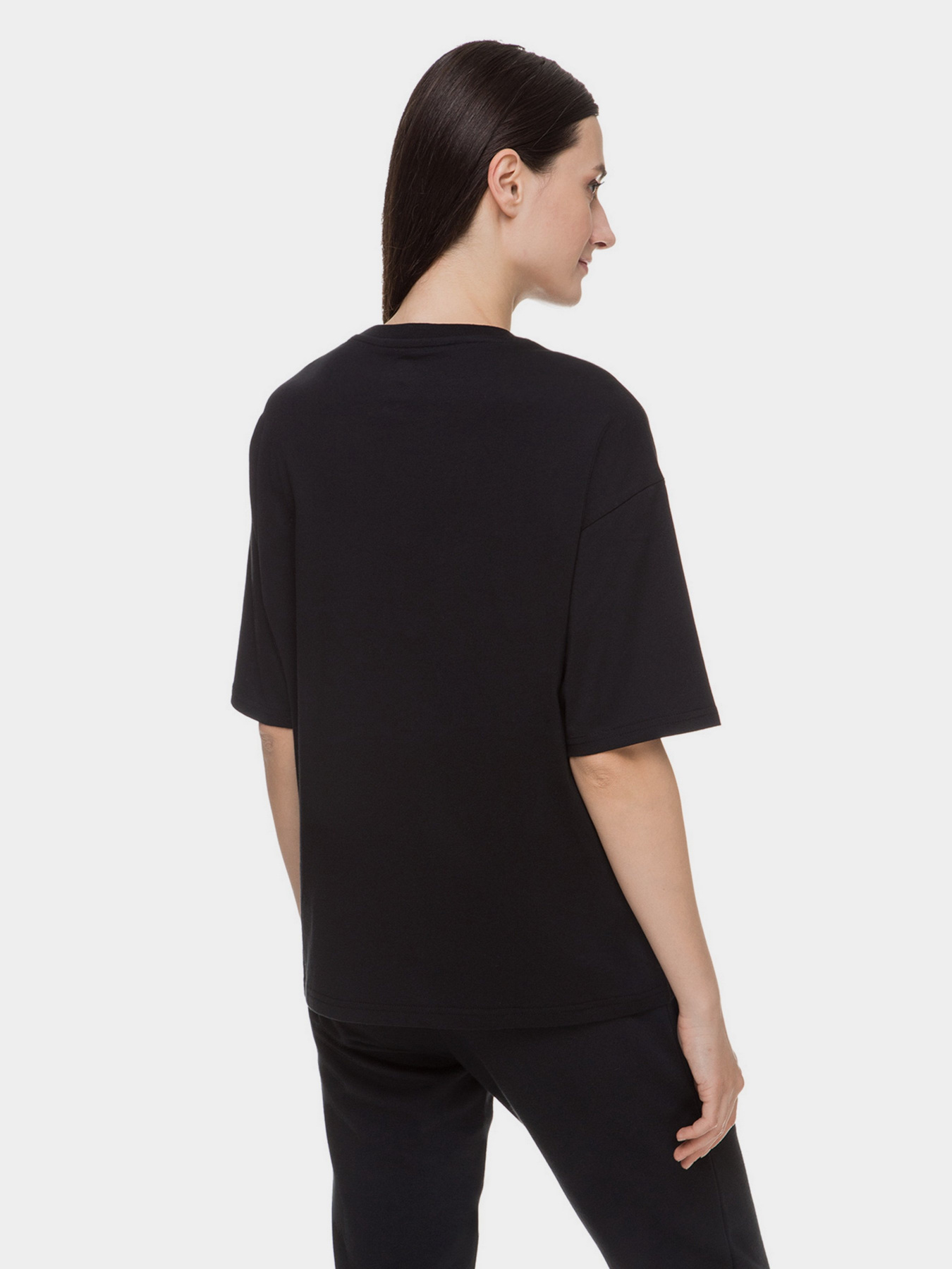 Футболка спортивна New Balance Essentials Stacked Logo модель WT03519BK Фото