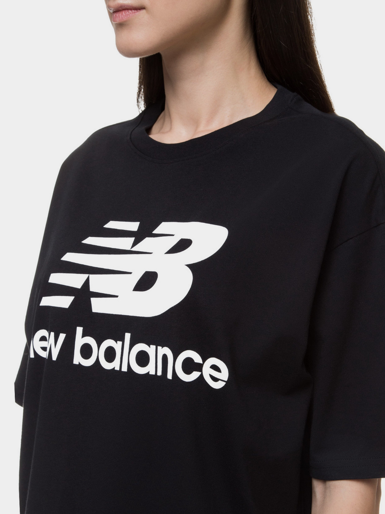 Футболка спортивна New Balance Essentials Stacked Logo модель WT03519BK Фото