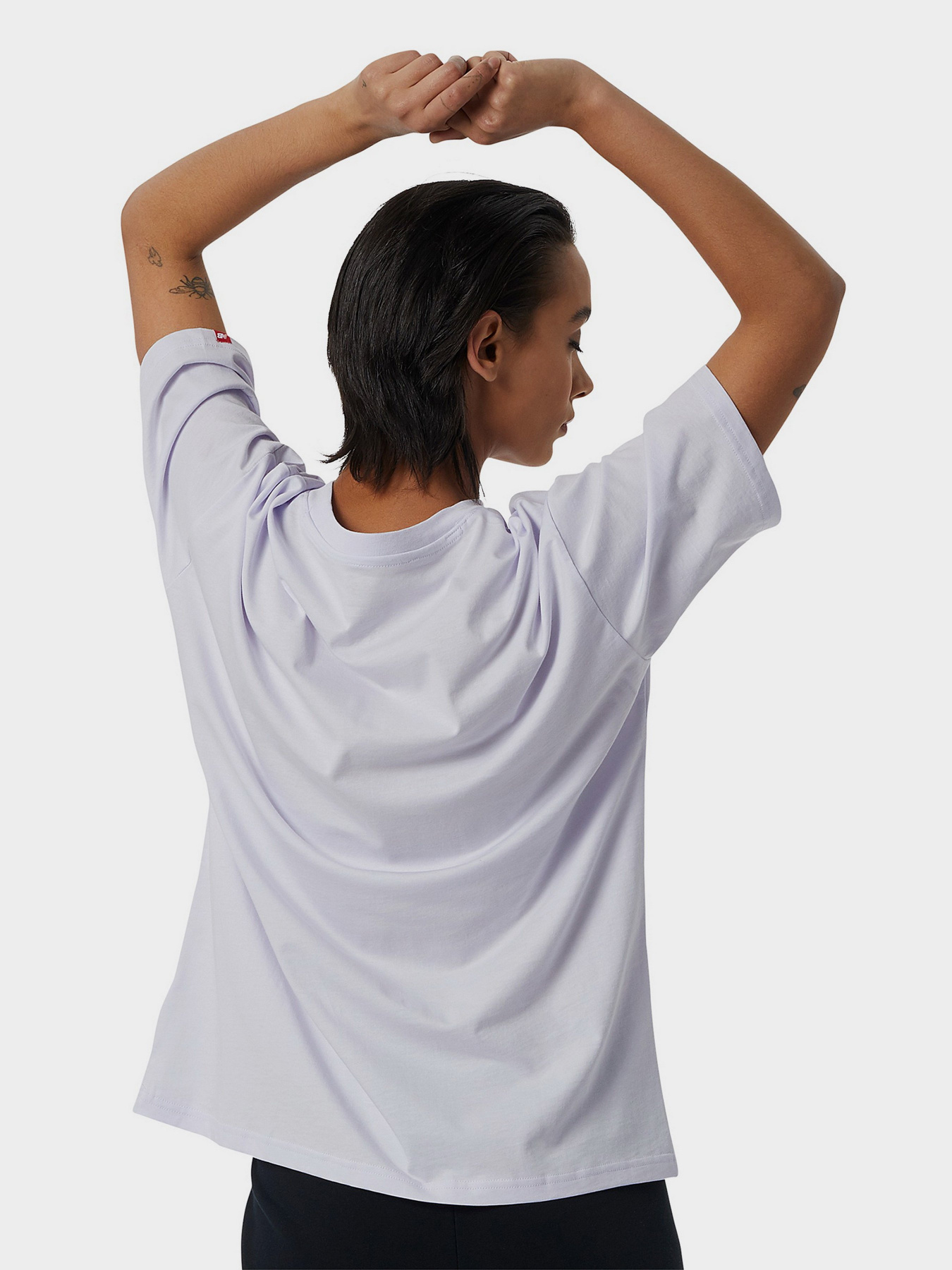 Футболка спортивна New Balance Essentials Stacked Logo модель WT03519LIA Фото