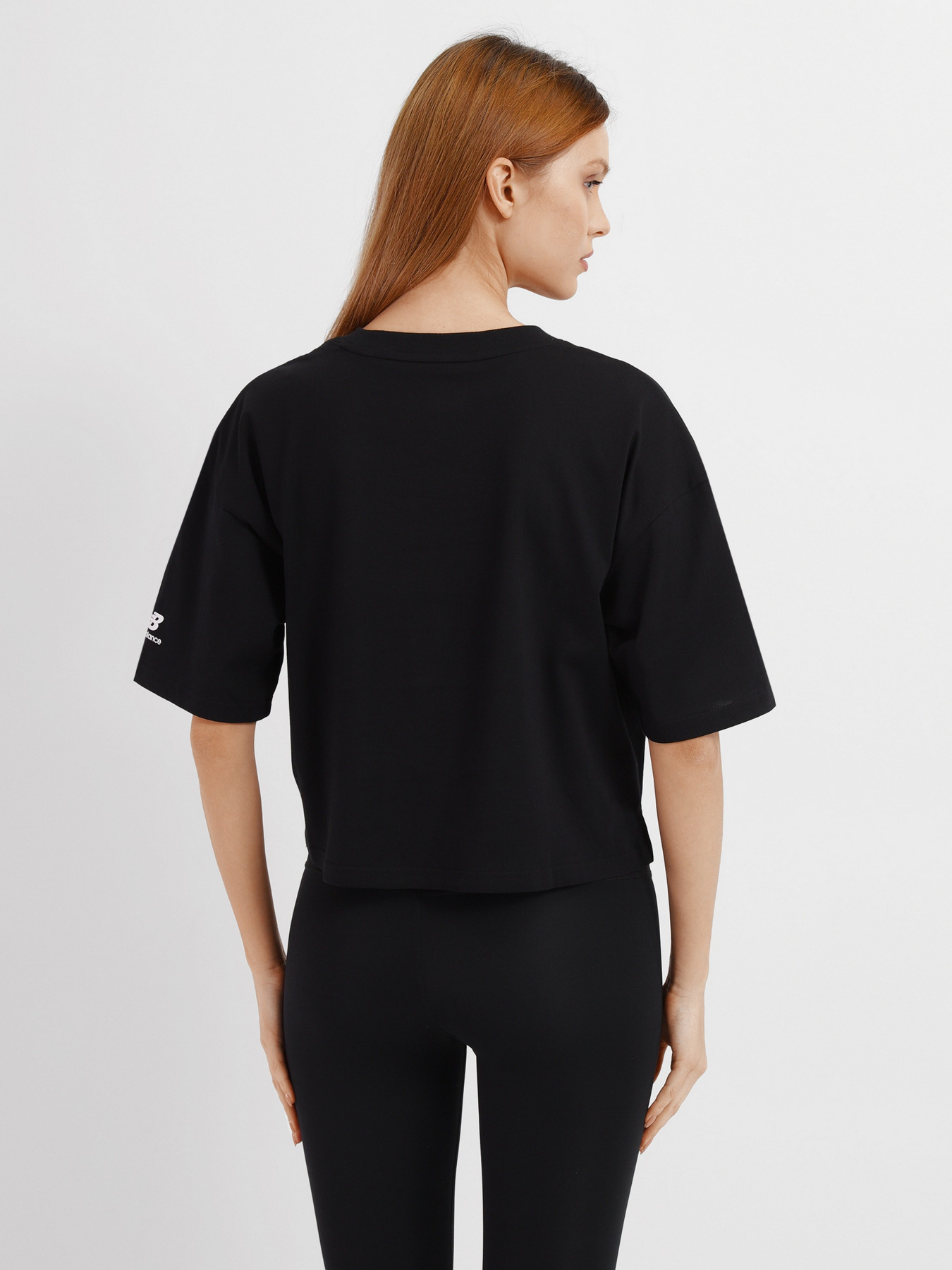 Футболки и поло New Balance Essentials Celebrate модель WT21510BK Футболки и поло New Balance Essentials Celebrate модель WT21510BK Фото