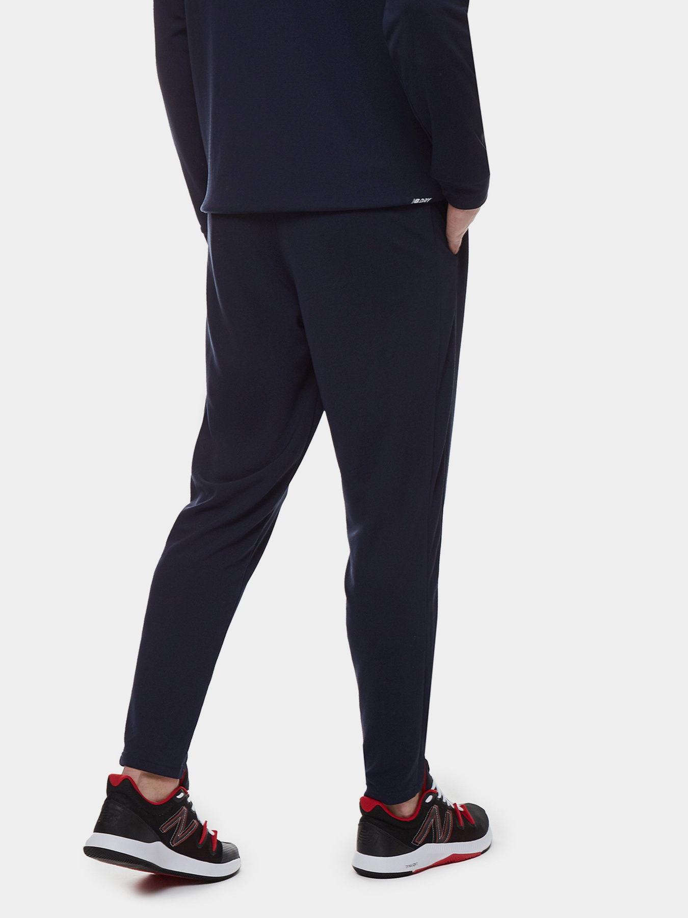 Спортивні штани New Balance NB Tech Training Knit Track модель MP21033ECL Фото