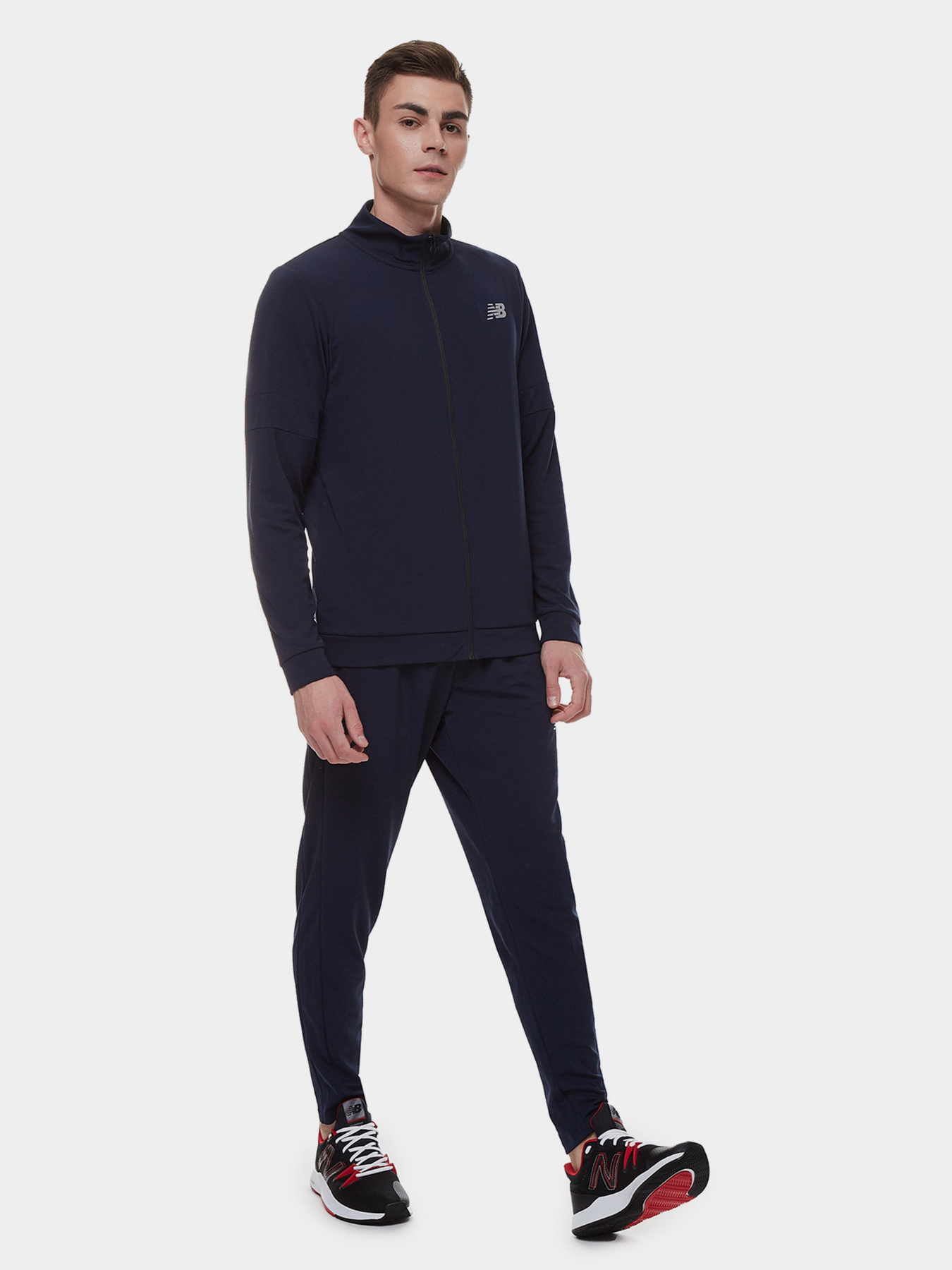 Спортивні штани New Balance NB Tech Training Knit Track модель MP21033ECL Фото