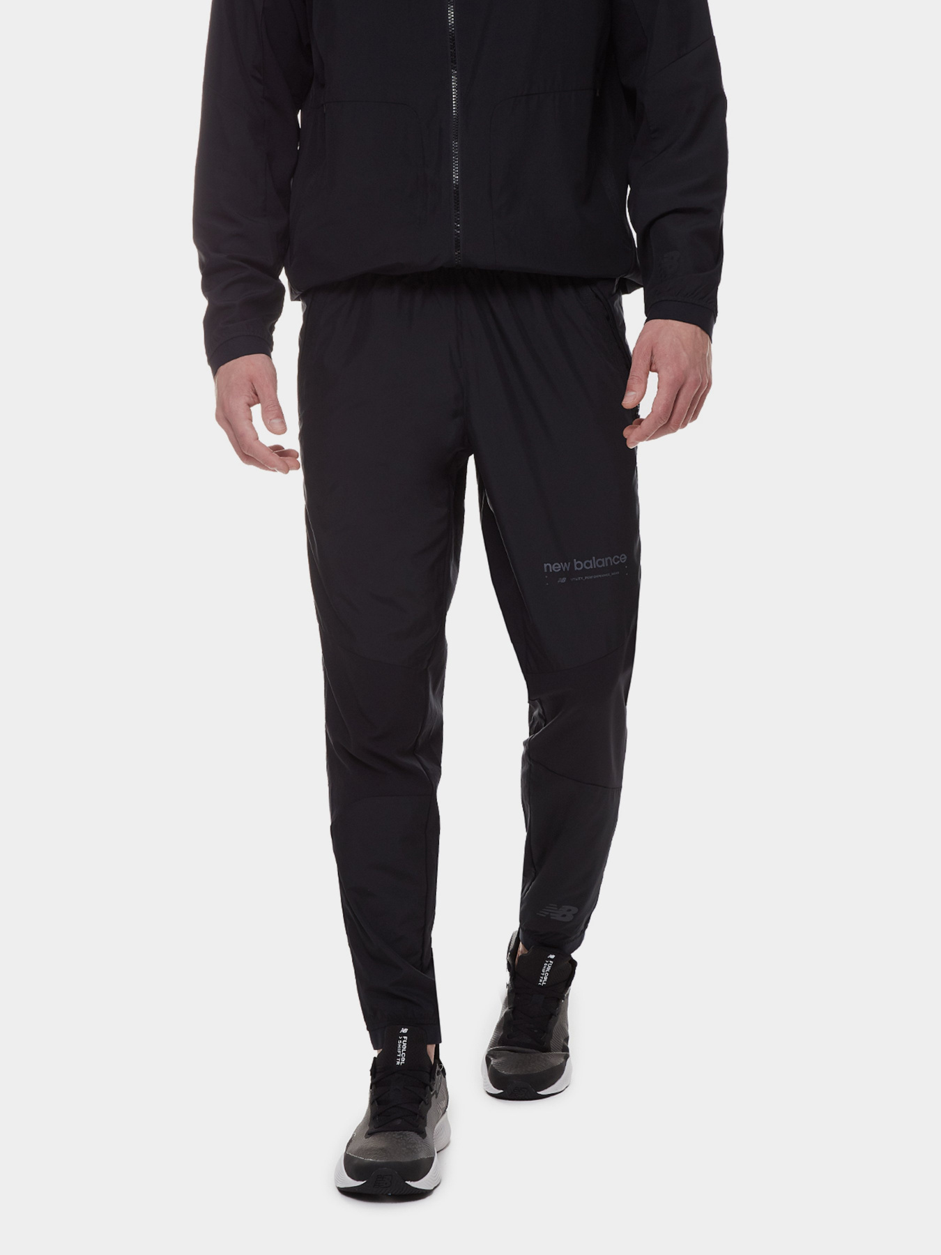 Спортивні штани New Balance R.W.Tech Lightweight Woven модель MP21049BK Фото