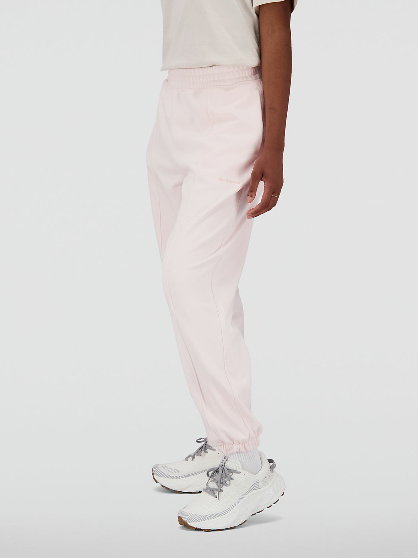 Спортивні штани New Balance Athletics Nature State модель WP23553WAN Фото