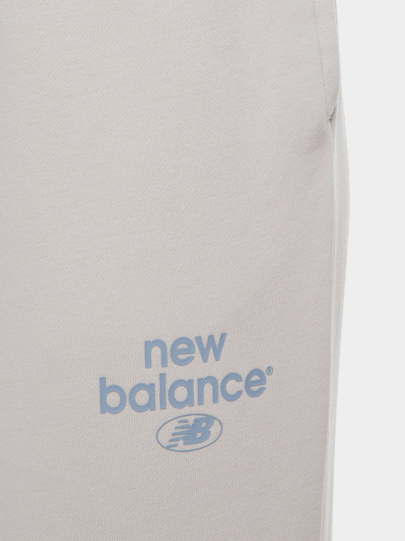 Спортивні штани New Balance Essentials Reimagined Arch модель WP31508MBM Фото