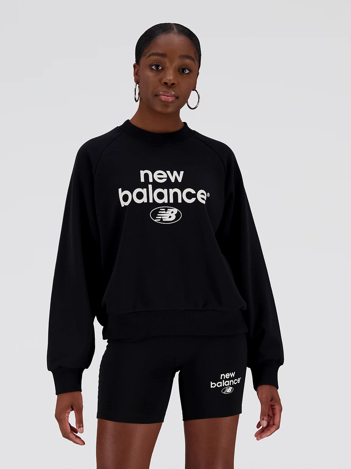 Свитшот New Balance Essentials Reimagined Arch модель WT31508BK Фото