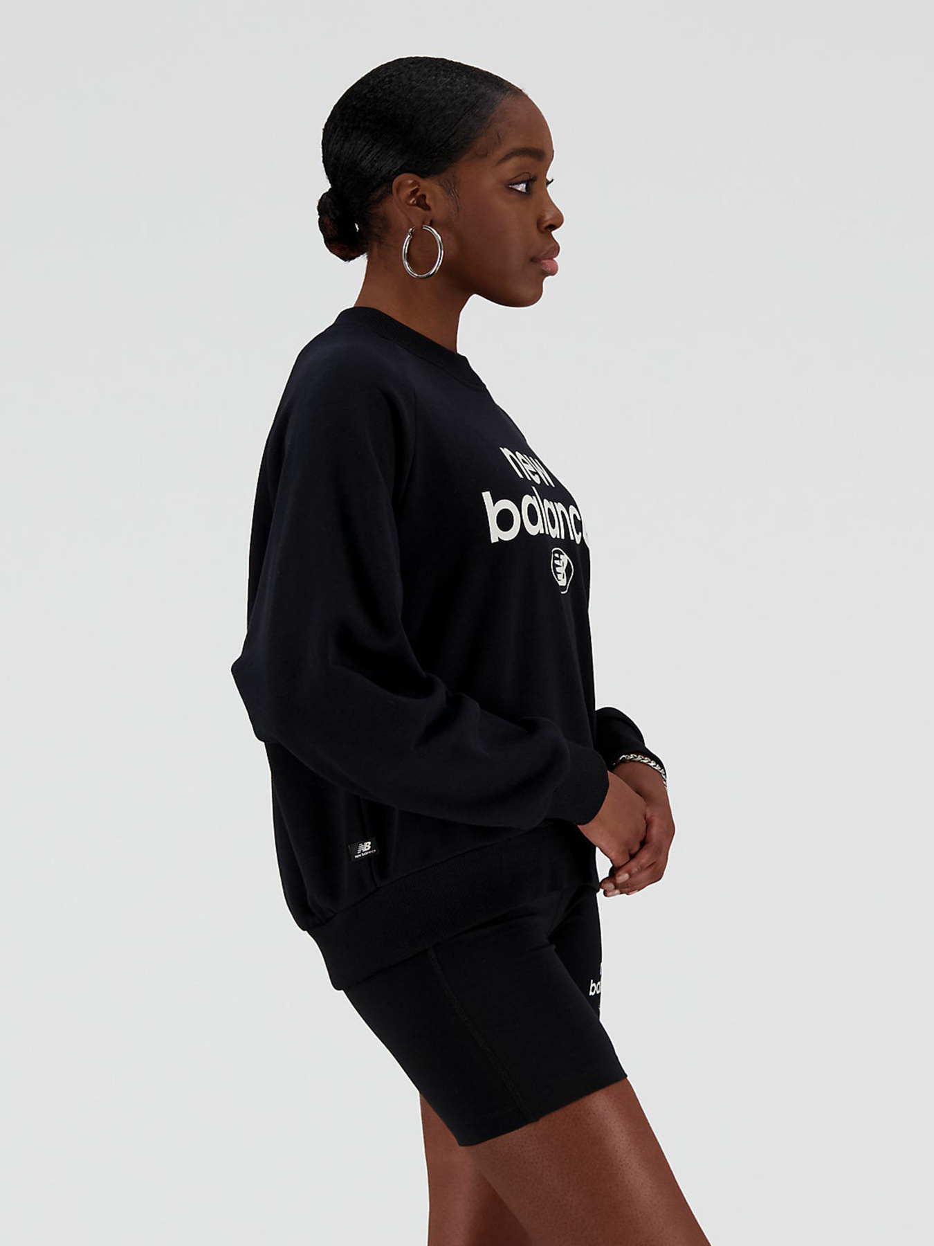 Свитшот New Balance Essentials Reimagined Arch модель WT31508BK Фото