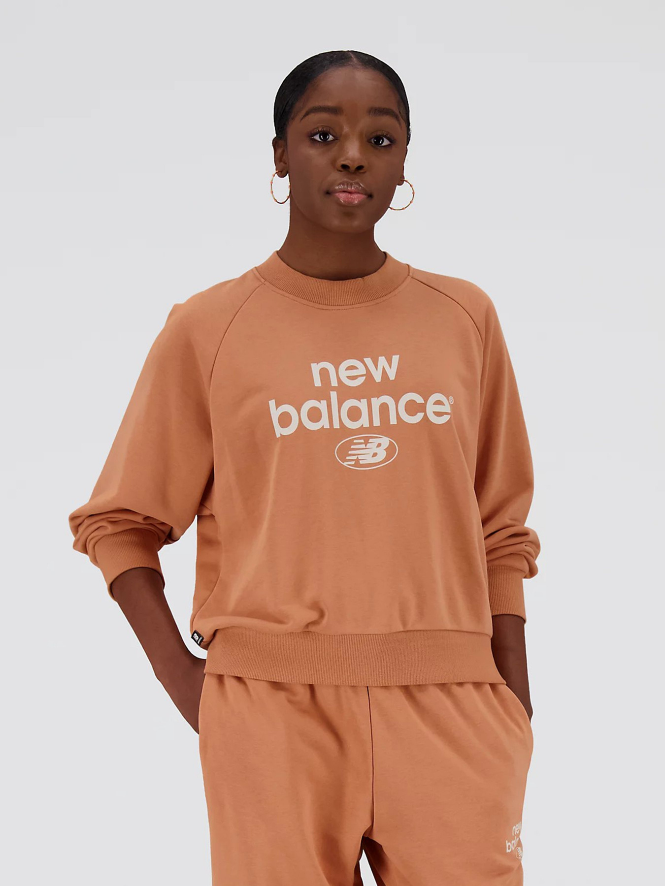 Свитшот New Balance Essentials Reimagined Arch модель WT31508SEI Фото