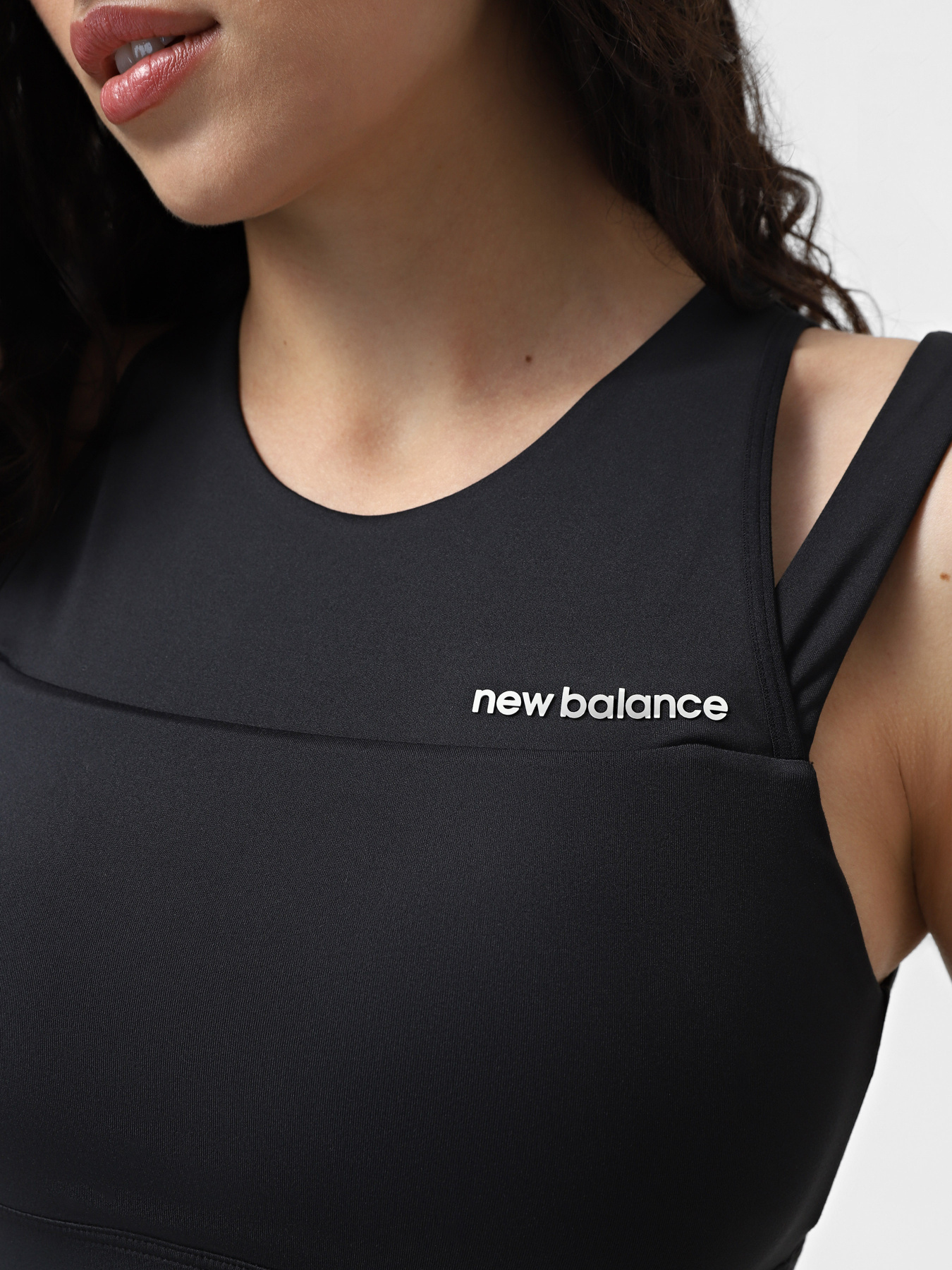 Спортивний топ New Balance Shape Shield модель WB21110BK Фото