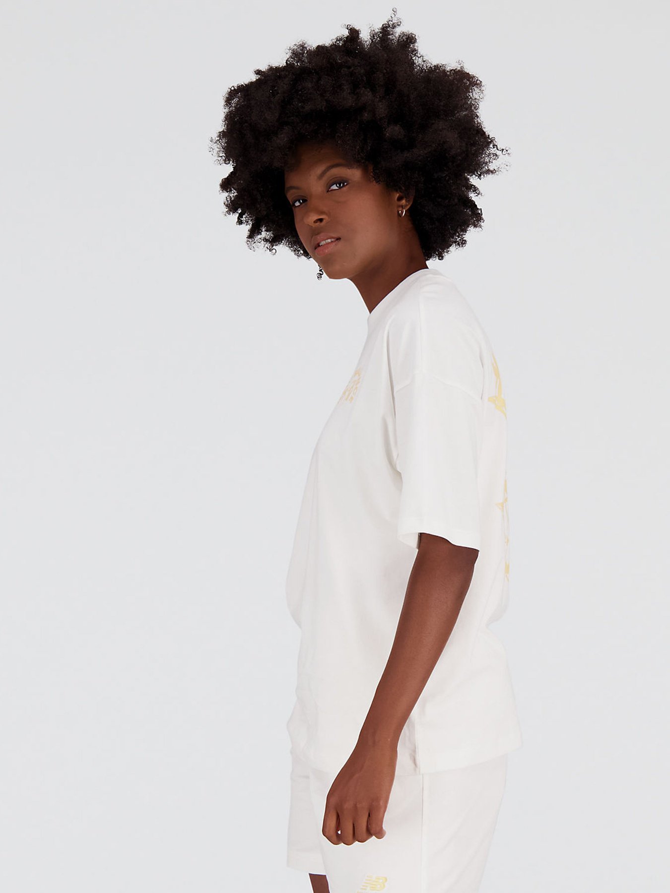 Футболка New Balance Essentials Bloomy модель WT31555SST Фото