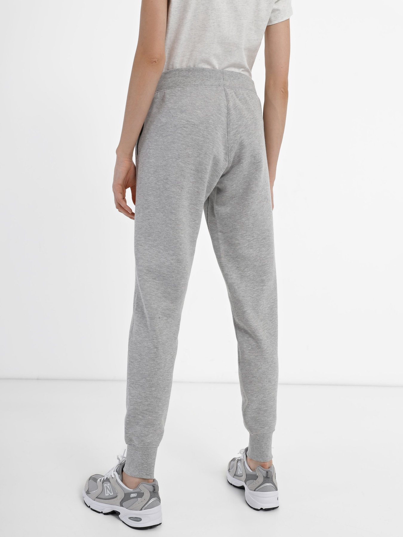 Штаны спортивные New Balance Essentials модель WP03805AG Фото