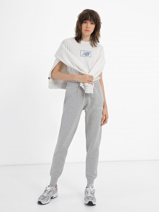 Спортивні штани New Balance Essentials модель WP03805AG Фото