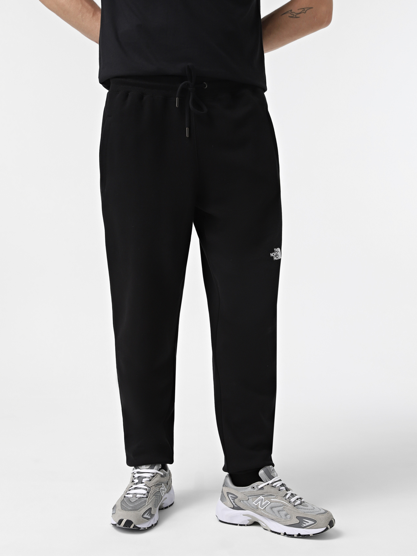 Спортивні штани The North Face NSE Light модель NF0A4T1FJK31 Фото