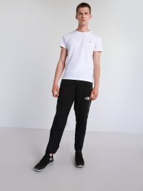 Штани повсякденні The North Face Mountain Athletics Woven Pant модель NF0A5599KX71 Фото