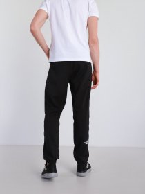 Штани повсякденні The North Face Mountain Athletics Woven Pant модель NF0A5599KX71 Фото