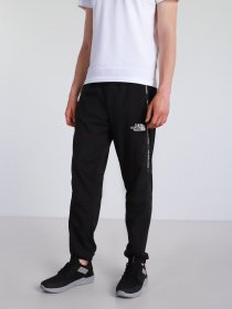 Повседневные штаны The North Face Mountain Athletics Woven Pant модель NF0A5599KX71 Повседневные штаны The North Face Mountain Athletics Woven Pant модель NF0A5599KX71 Фото