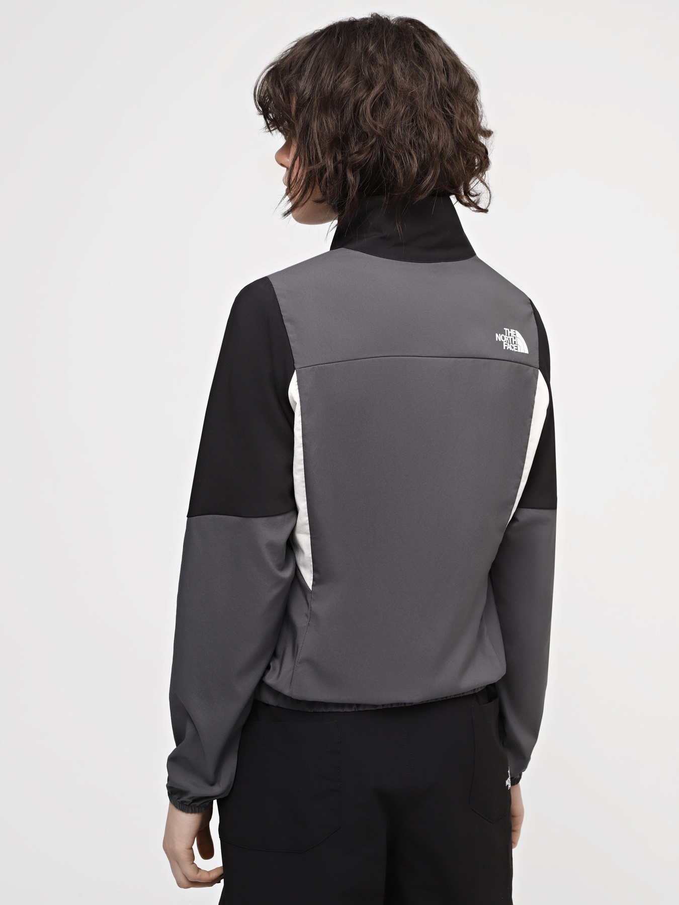 Куртки та дублянки The North Face W Ma Wind Track Top модель NF0A87FM3OD1 Фото