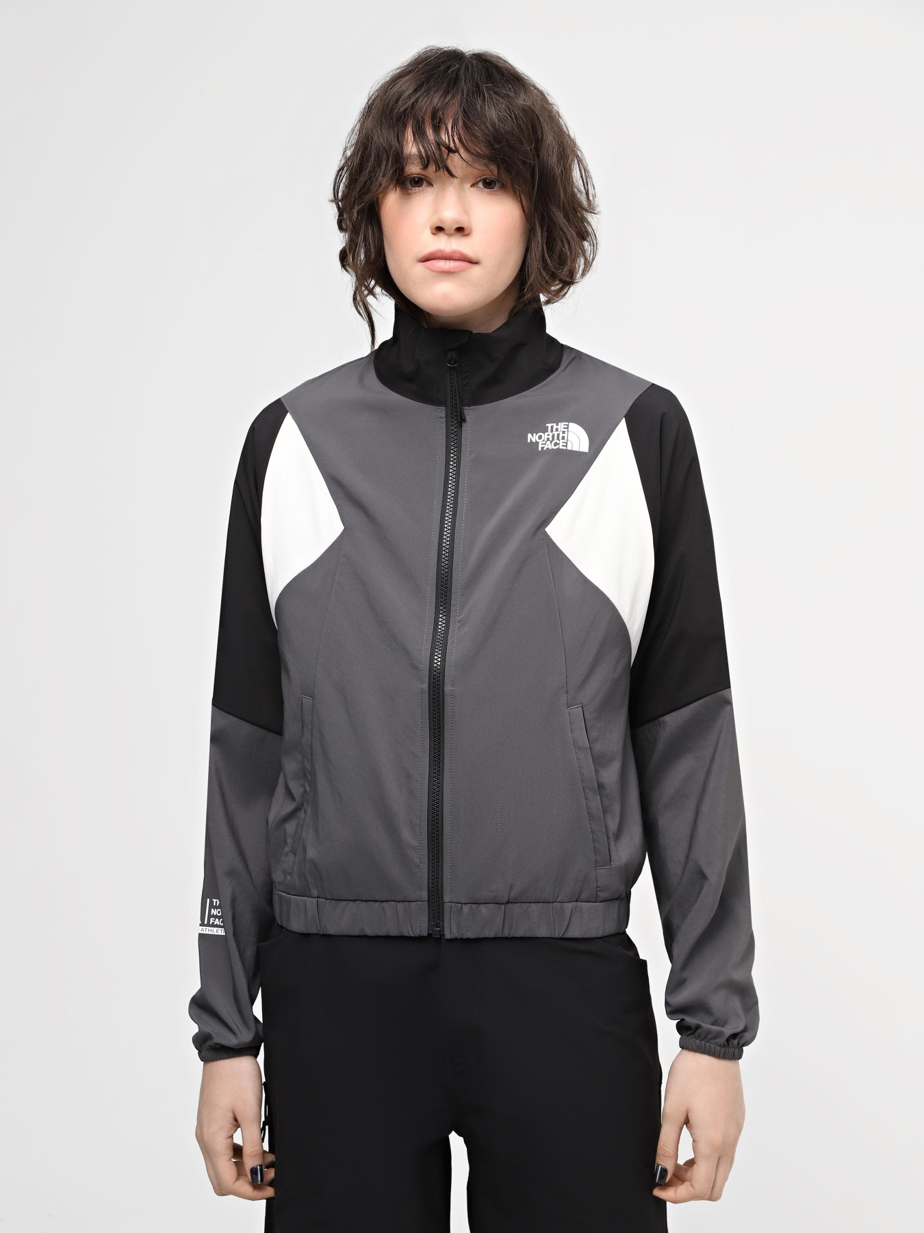 Куртки та дублянки The North Face W Ma Wind Track Top модель NF0A87FM3OD1 Фото