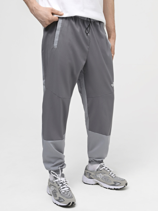 Штаны спортивные The North Face M Ma Wind Track Pant модель NF0A87J6W2O1 Фото