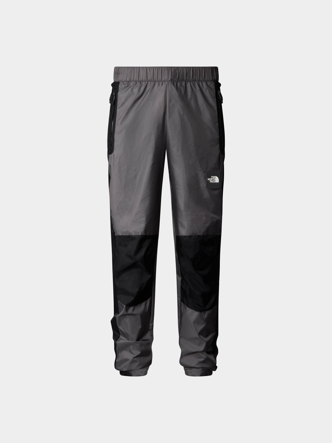 Повсякденні штани The North Face M Wind Shell Pant модель NF0A879QRPI1 Фото