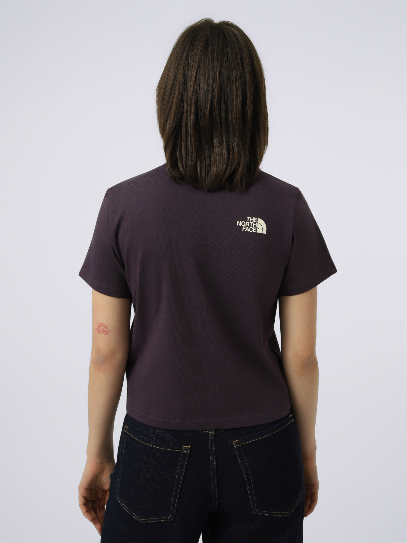 Футболки и поло The North Face W FLORA EMBRO REGULAR SHORT SL модель NF0A8G9QG5O1 Фото