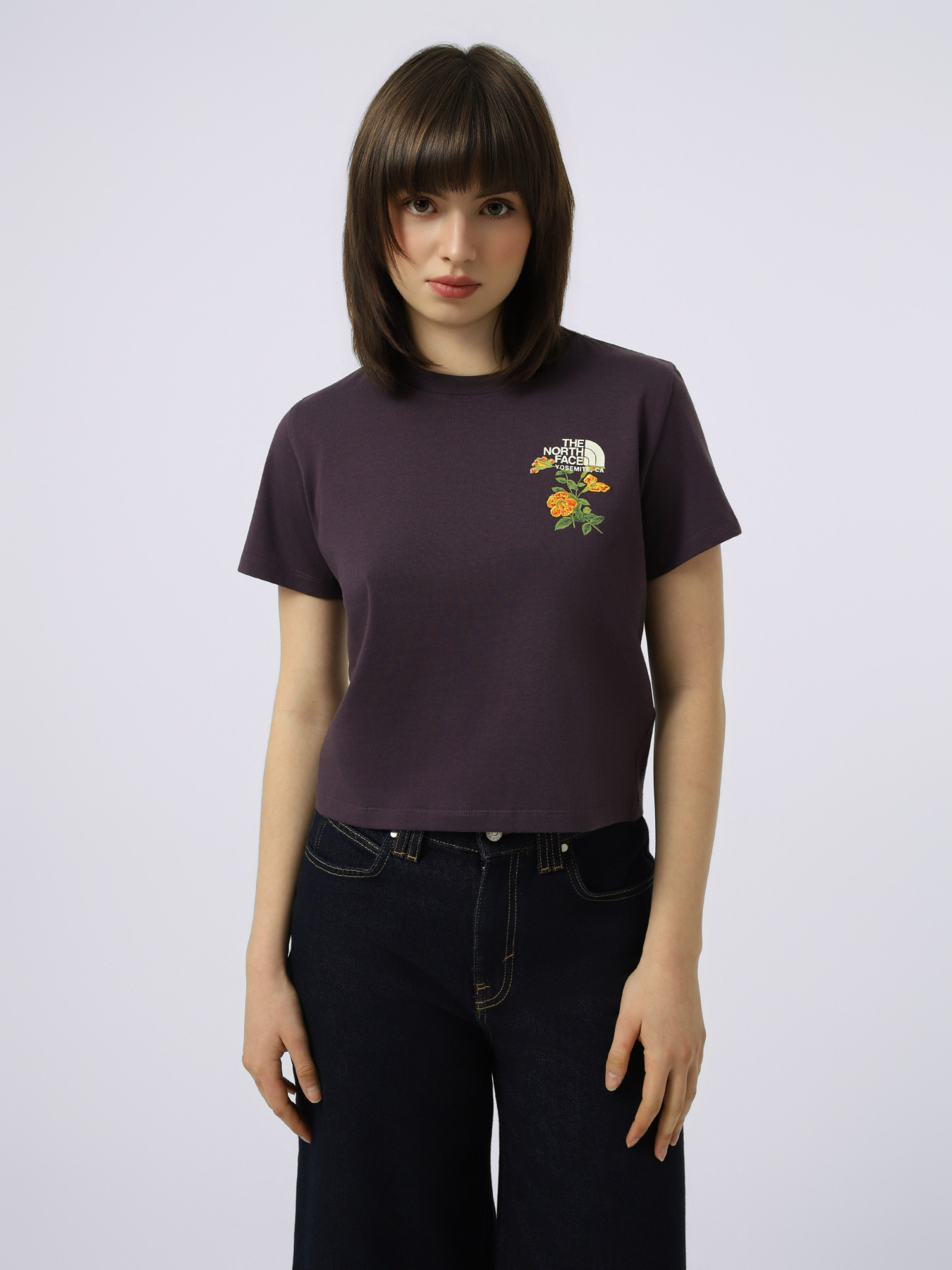 Футболки и поло The North Face W FLORA EMBRO REGULAR SHORT SL модель NF0A8G9QG5O1 Фото