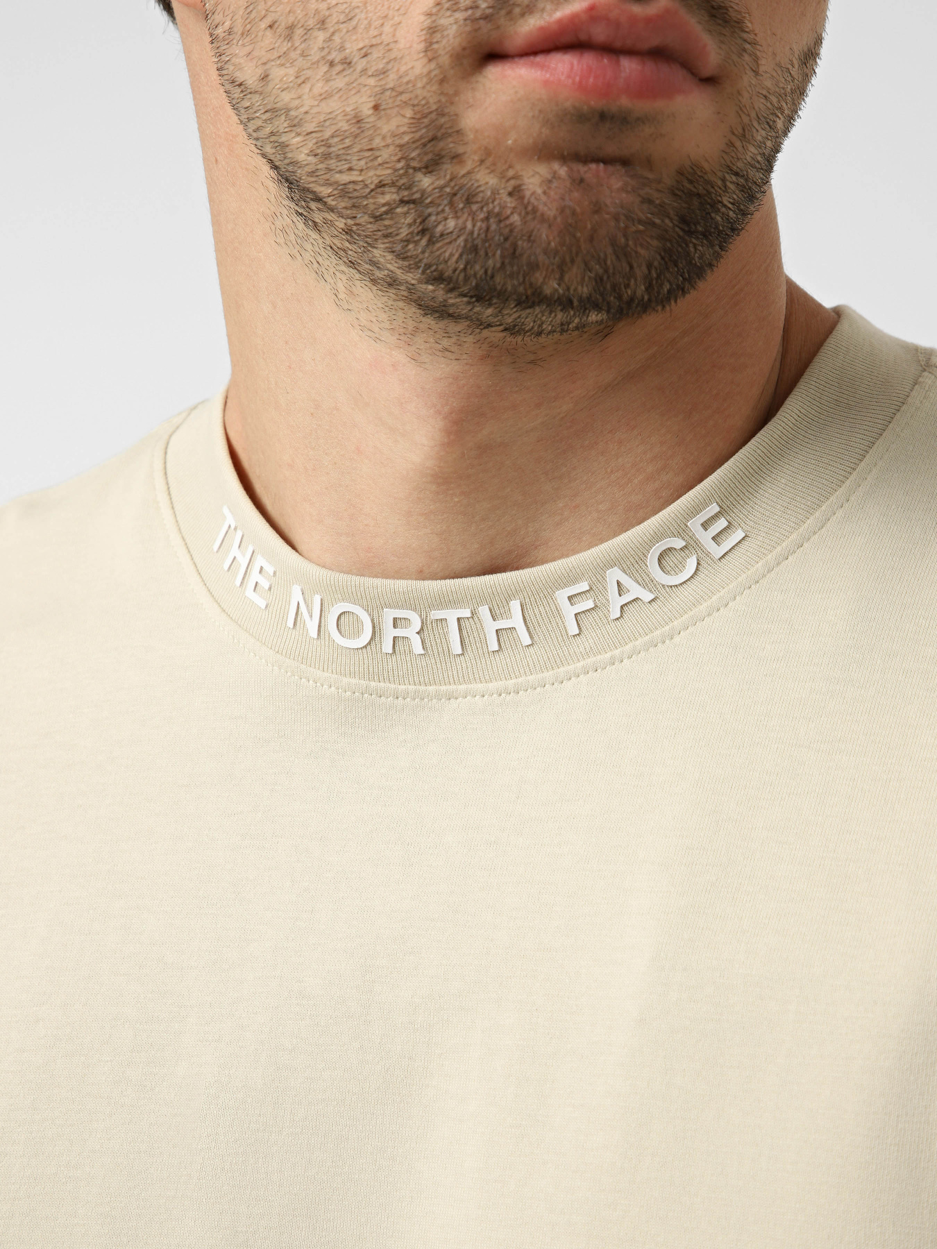 Футболки и поло The North Face M ZUMU RELAXED SHORT SLEEVE TE модель NF0A8GUYDOM1 Фото