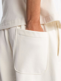 Джогери The North Face W TNF RED BOX SWEATPANTS модель NF0A8EG2QLI1 Джогери The North Face W TNF RED BOX SWEATPANTS модель NF0A8EG2QLI1 Фото