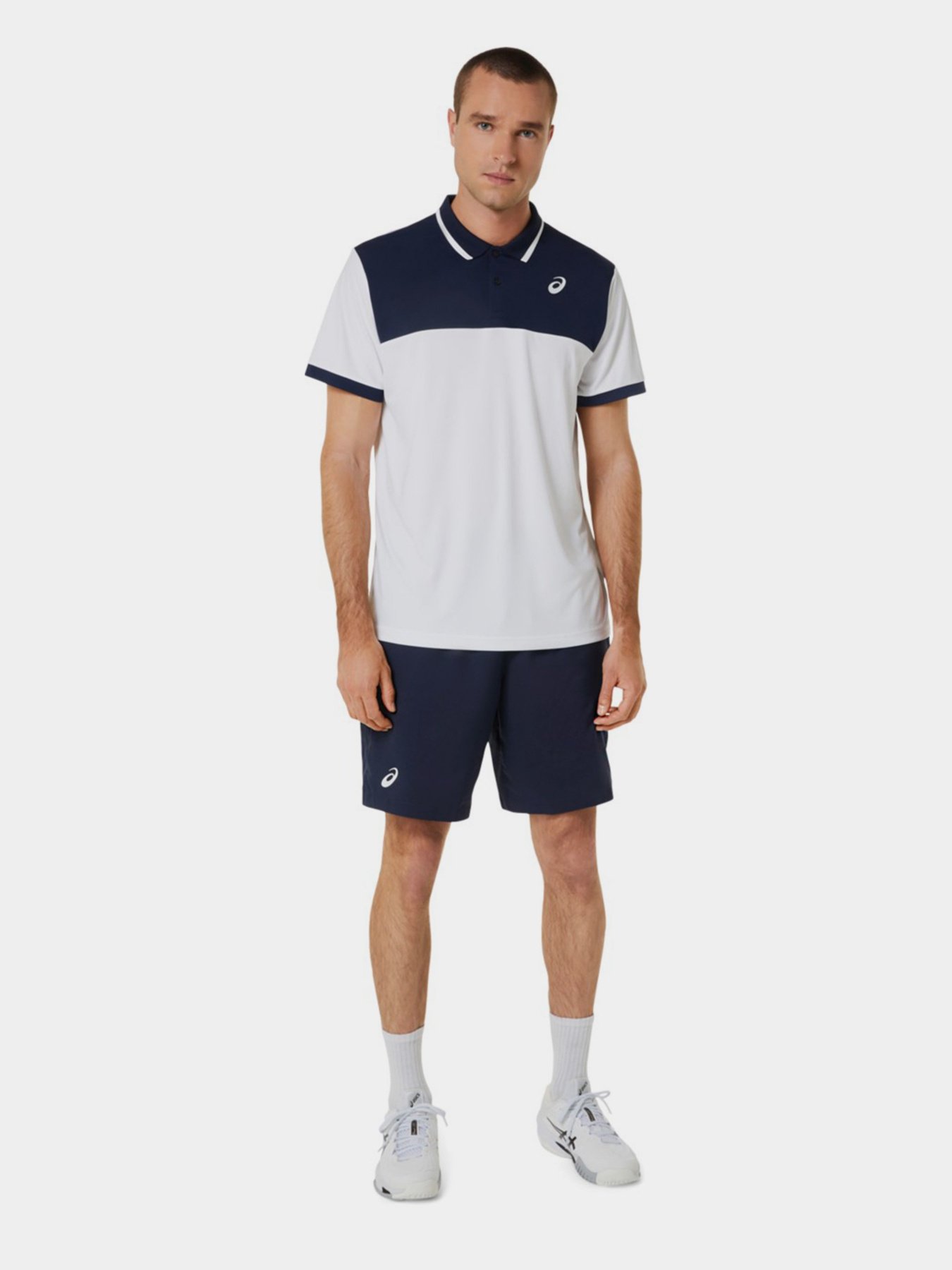 Шорты спортивные Asics Court 9in модель 2041A261-400 Синій Фото