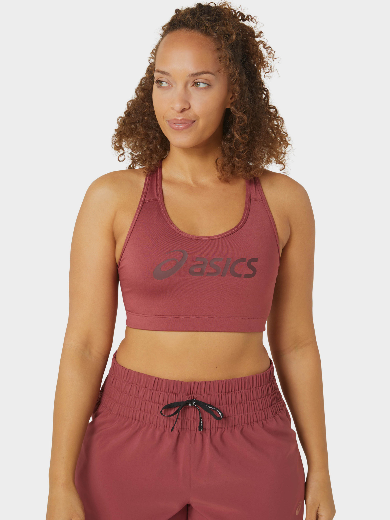 Топ спортивный Asics Core модель 2012C573-600 Рожевий, червоний Фото