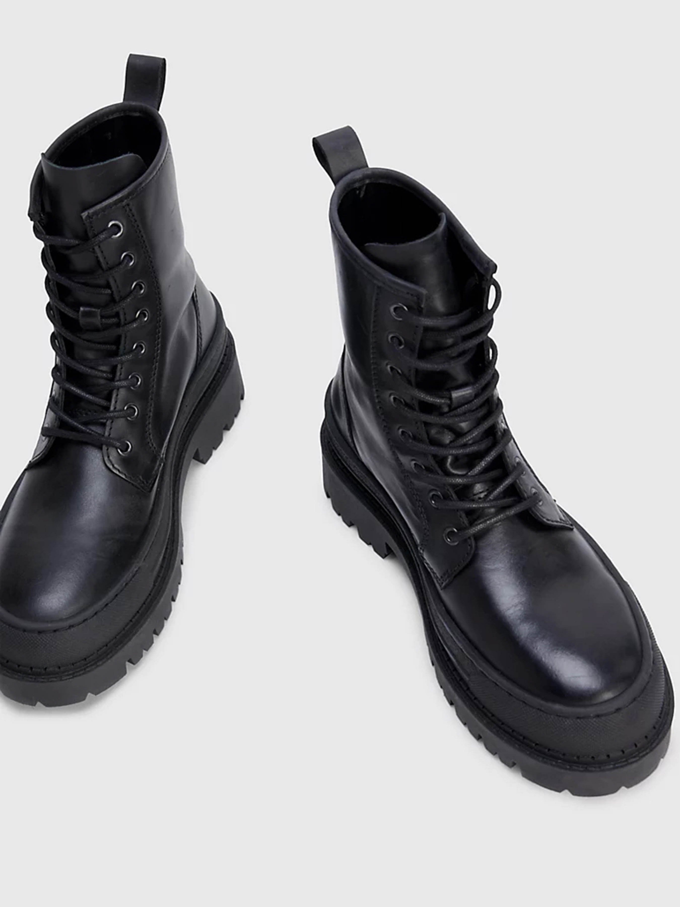 Черевики Tommy Hilfiger CHUNKY CLEAT LEATHER ANKLE модель EN0EN02217-BDS Фото