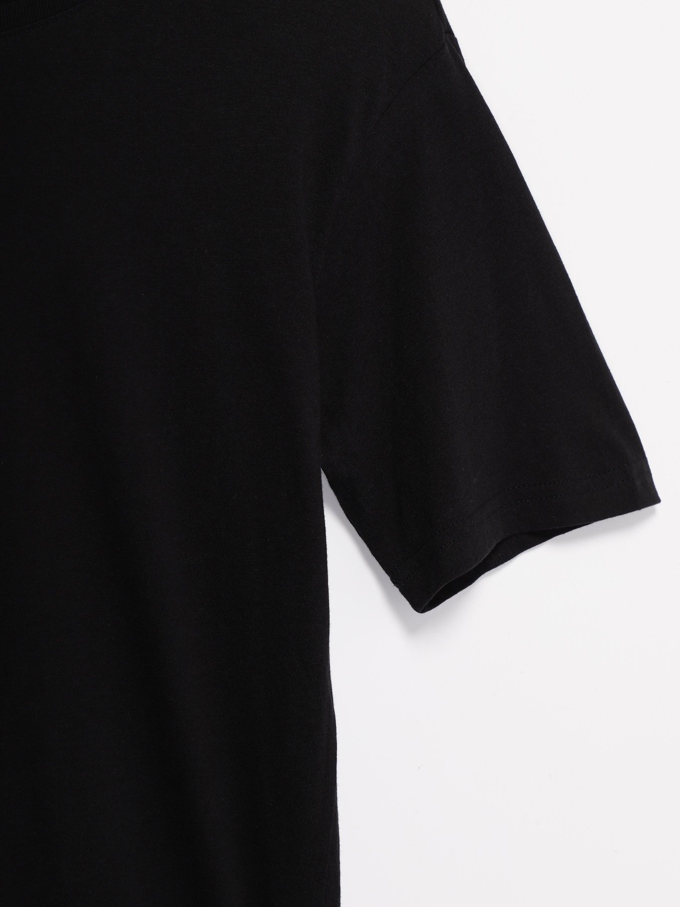 Футболка Weekday модель 0313728_чорний Фото