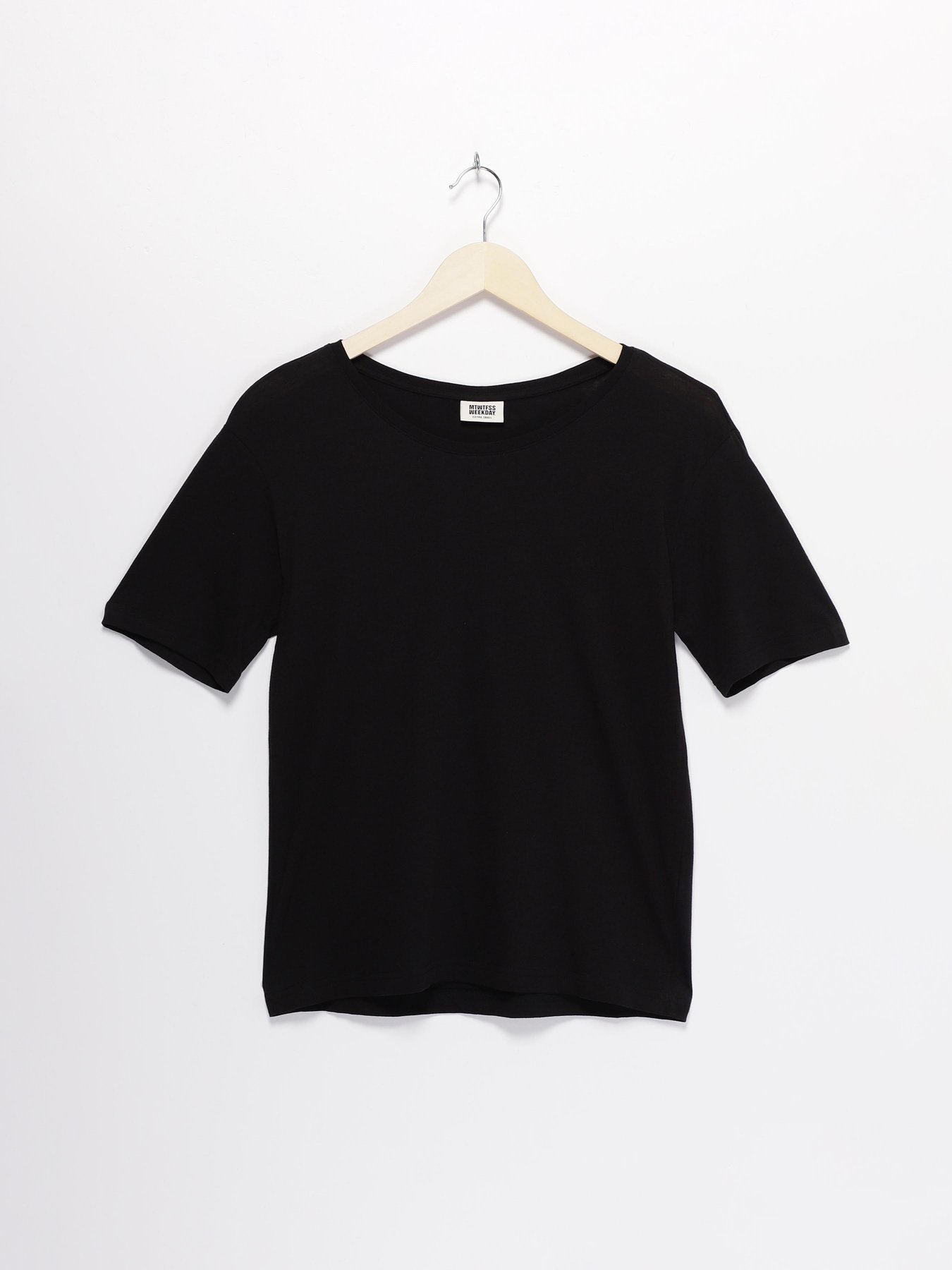 Футболка Weekday модель 0313728_чорний Фото