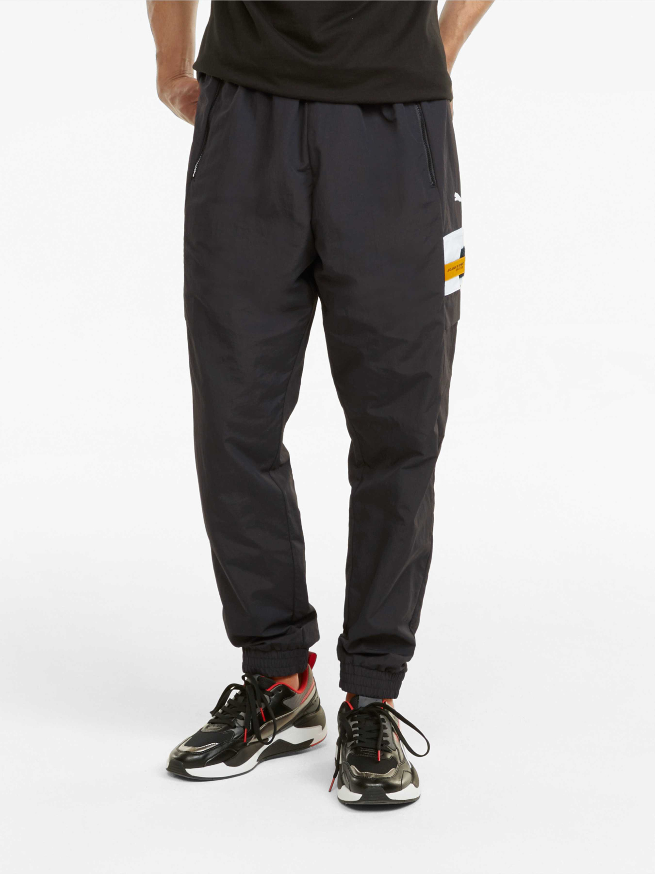 Штаны спортивные PUMA Ferrari Race Stmnt Woven Pnt модель 531646 Фото