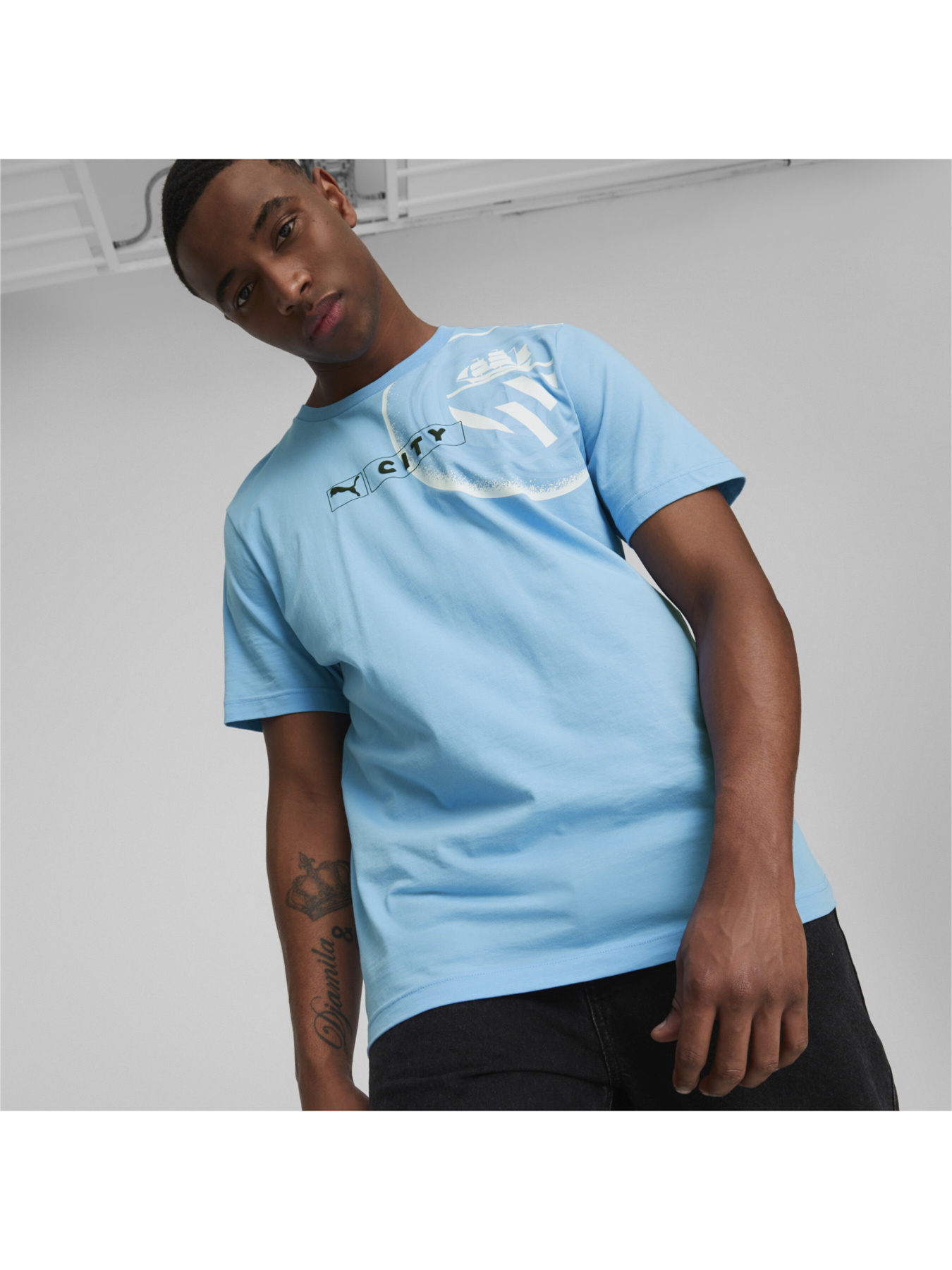 Спортивная футболка PUMA модель 769477 Спортивная футболка PUMA модель 769477 Фото