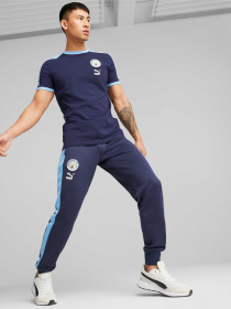 Штаны спортивные PUMA Mcfc Ftblheritage T7 Pants модель 769497 Штаны спортивные PUMA Mcfc Ftblheritage T7 Pants модель 769497 Фото