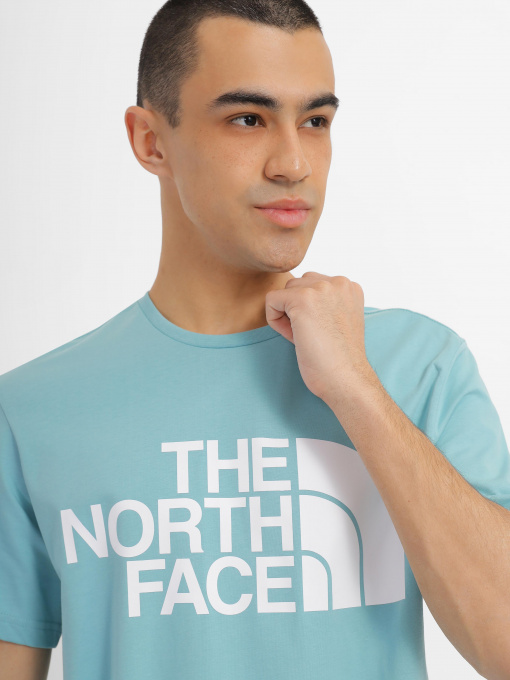 Футболкалар мен поло жейделер The North Face үлгі NF0A4M7XLV21 Фото