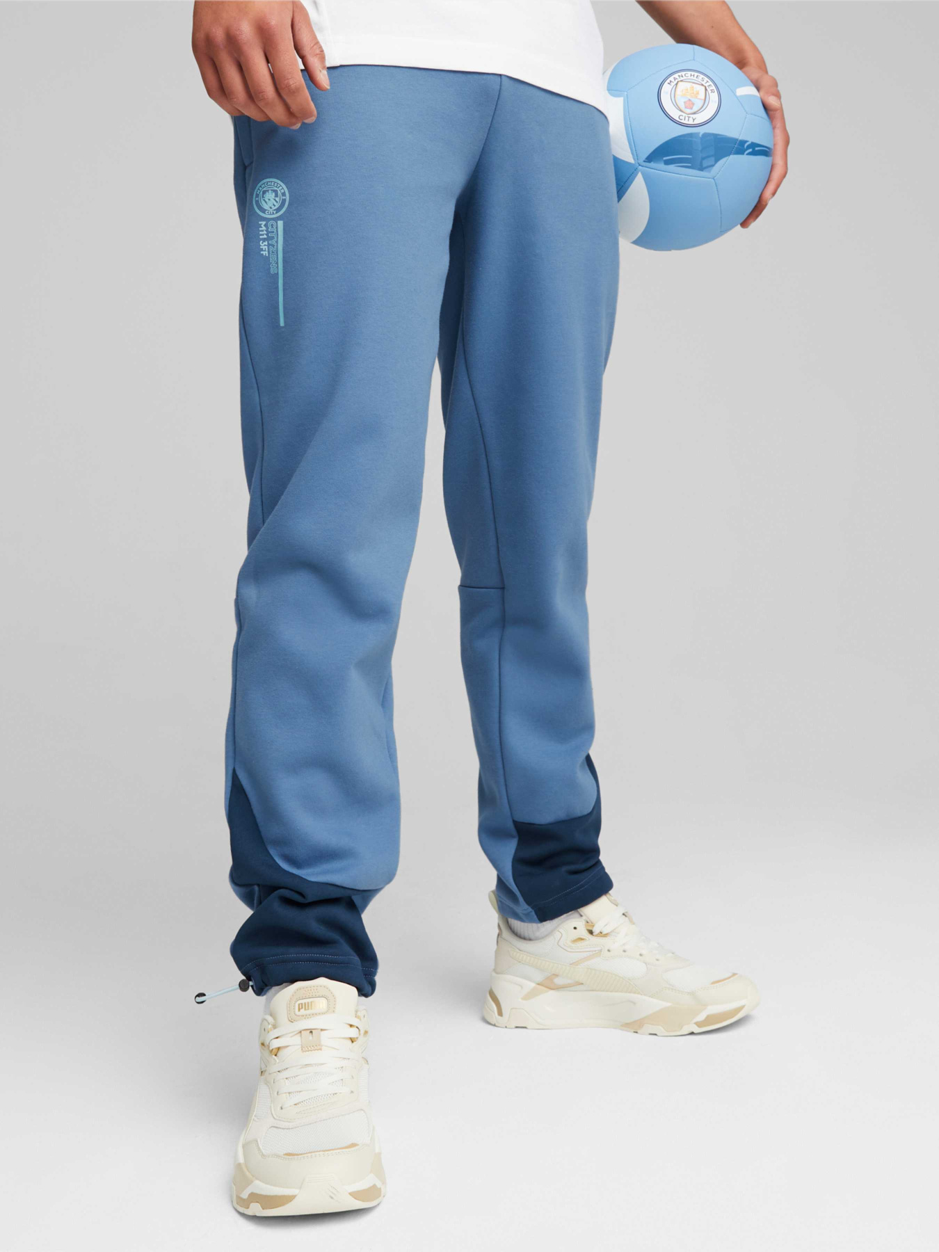 Штаны спортивные PUMA Mcfc Ftblculture Pants модель 772967 Штаны спортивные PUMA Mcfc Ftblculture Pants модель 772967 Фото