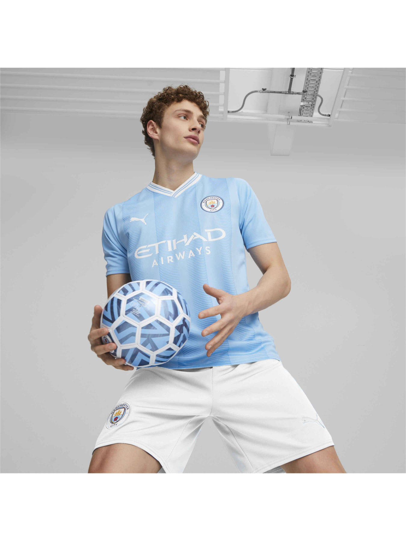 Футболка спортивна PUMA Mcfc Home Jersey Replica модель 770438 Фото
