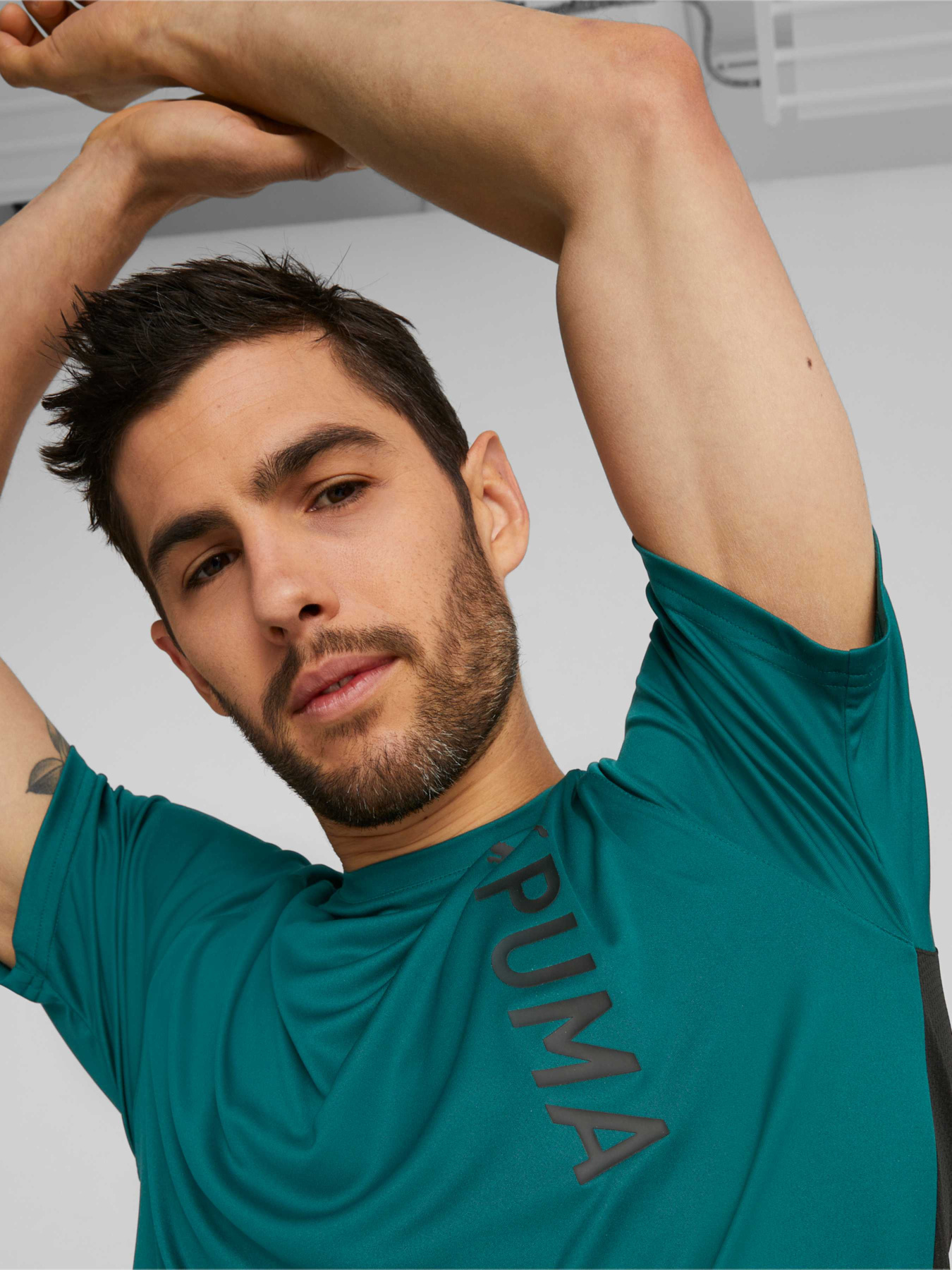 Спортивная футболка PUMA Fit Ss Tee модель 522119 Спортивная футболка PUMA Fit Ss Tee модель 522119 Фото