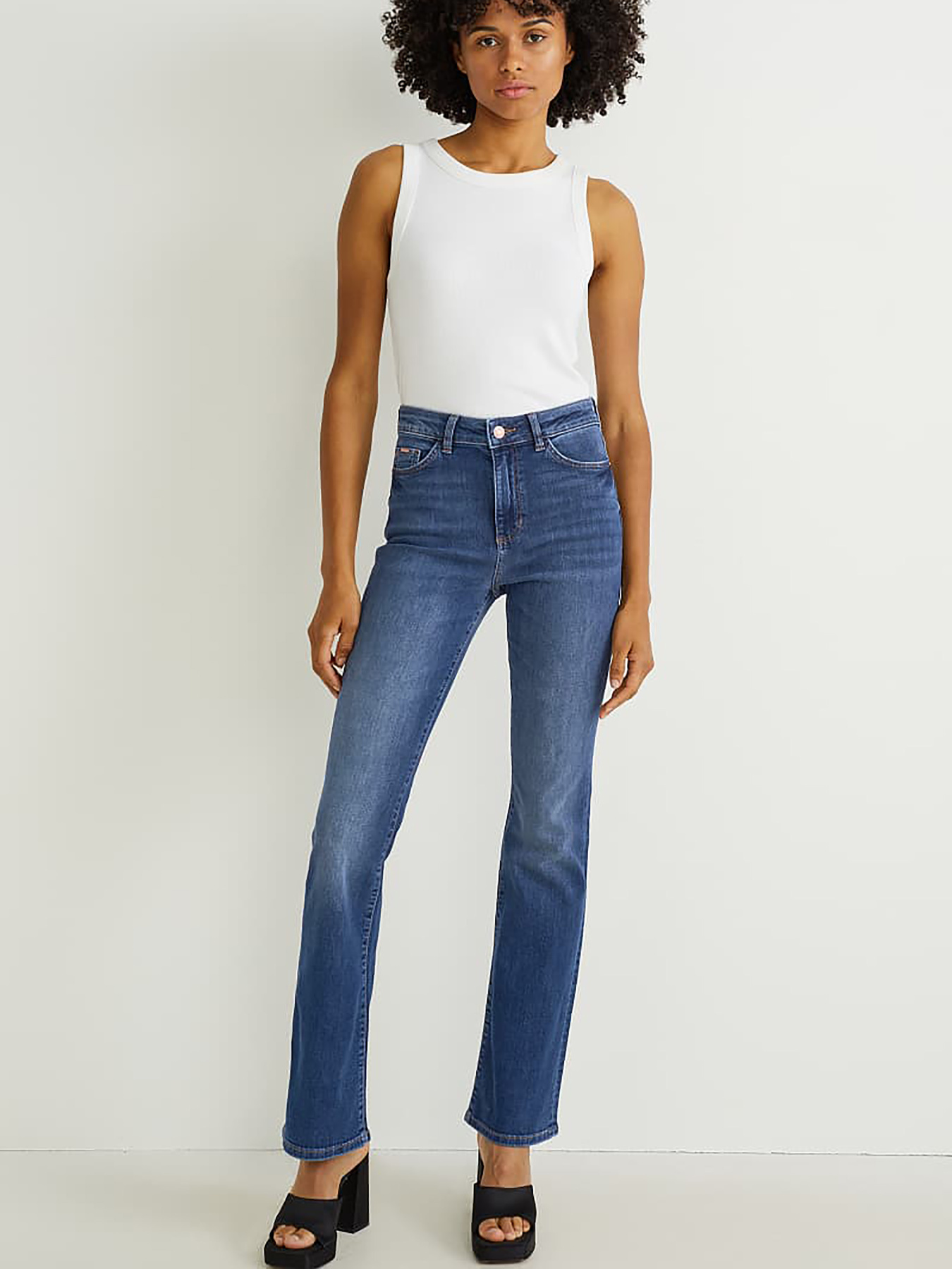 Расклешенные джинсы C&A модель 71737 Фото