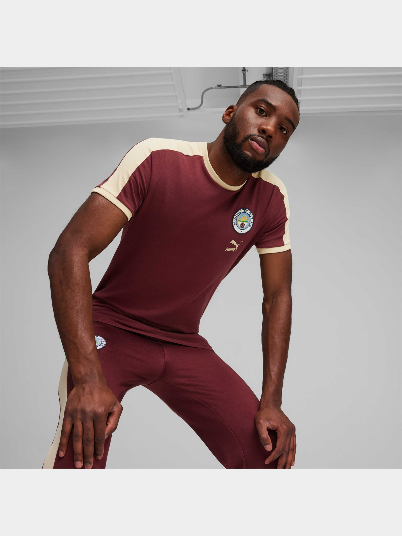 Спортивная футболка PUMA Mcfc Ftblheritage T7 Tee модель 769495 Фото