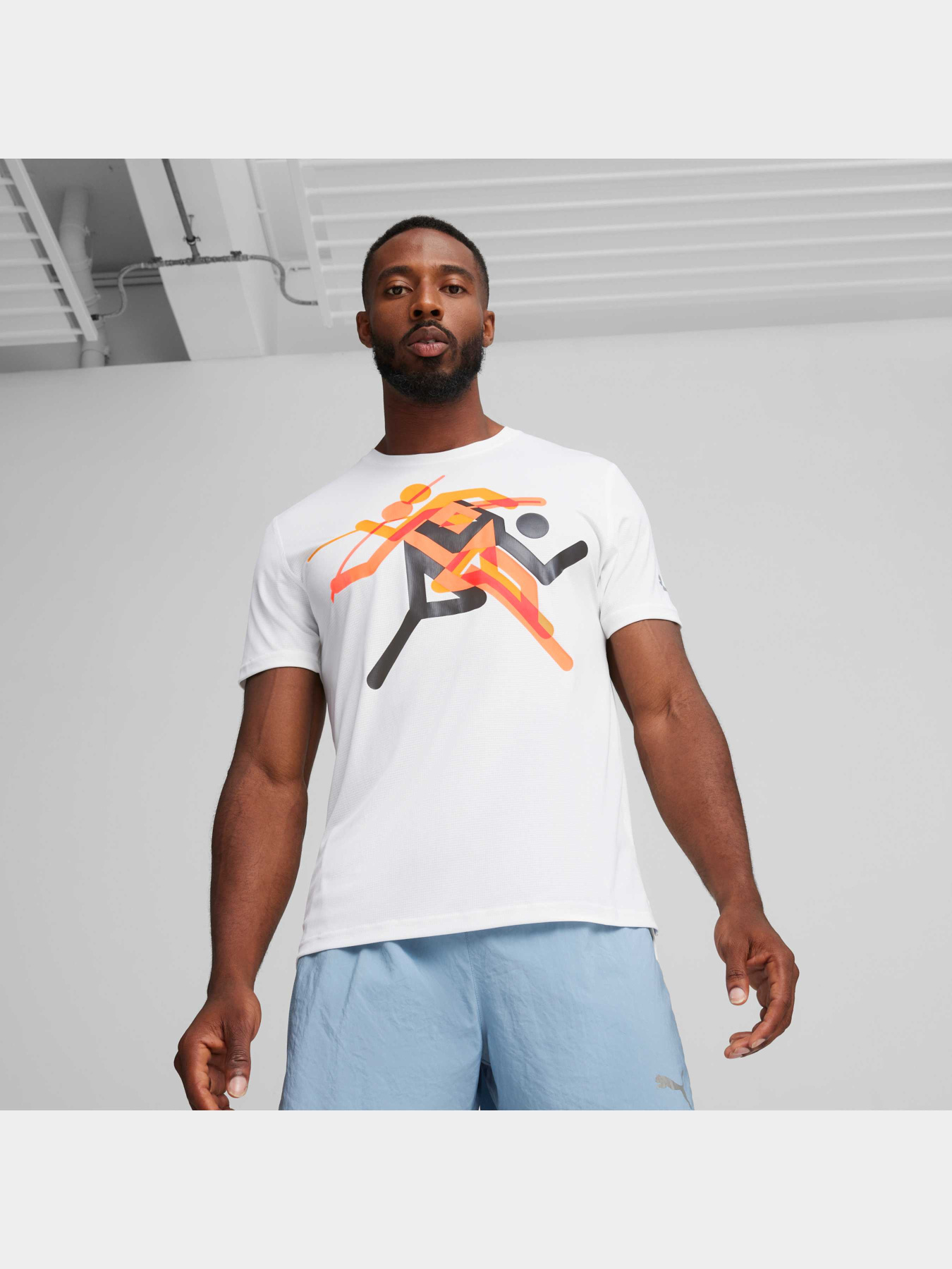 Футболка спортивна PUMA Run Faster Icons Graphic Tee модель 525000 Фото