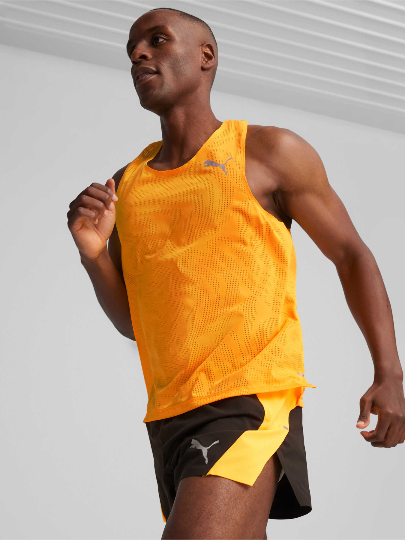 Футболки и поло PUMA Run Ultraspun Singlet модель 525057 Футболки и поло PUMA Run Ultraspun Singlet модель 525057 Фото