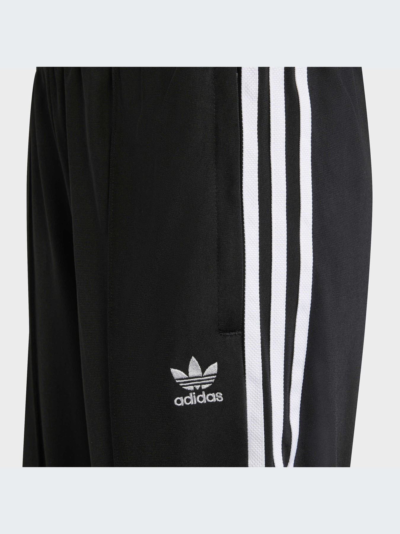 Повсякденні штани Adidas Adicolor модель HK0347 Фото