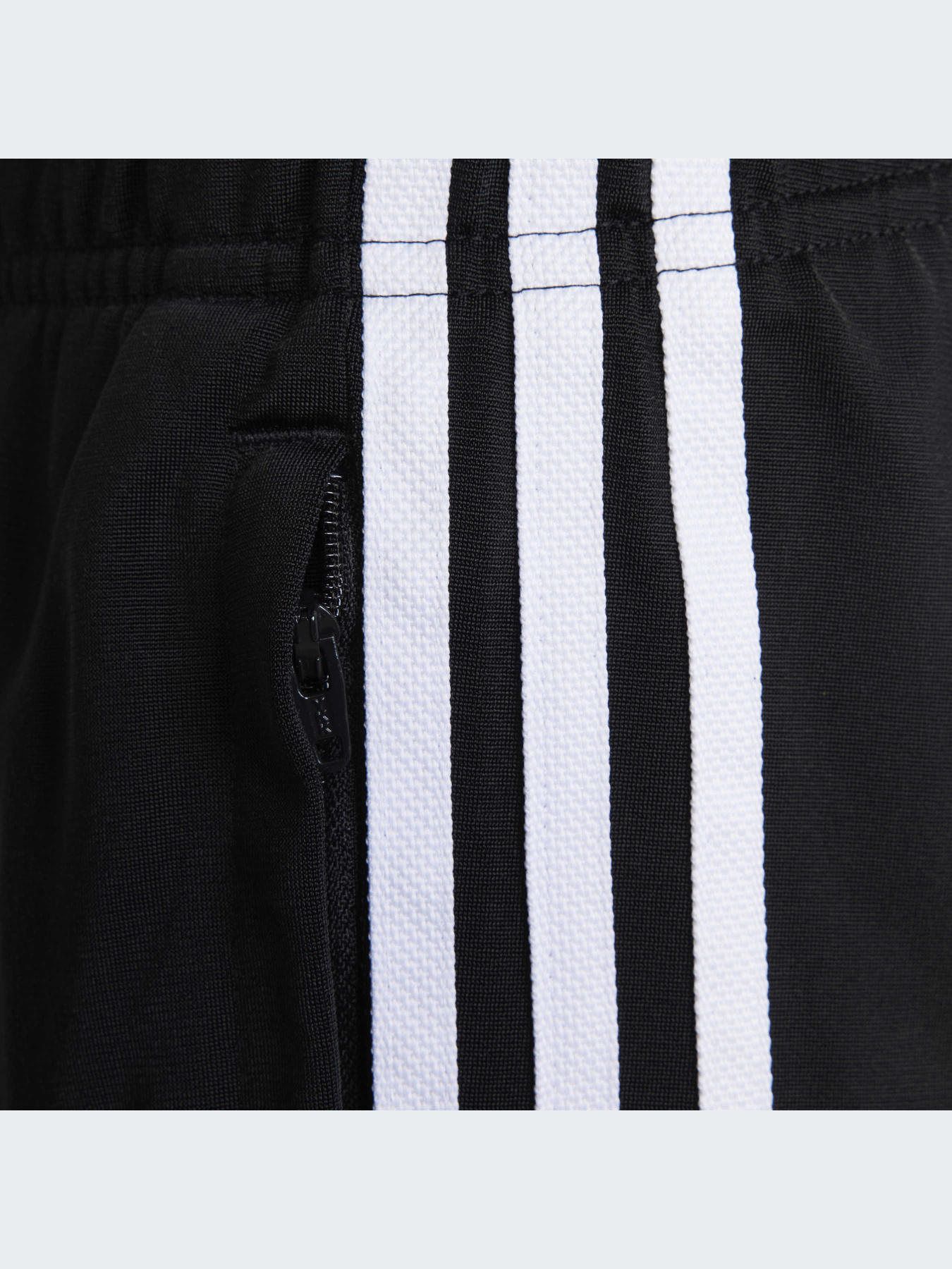 Повсякденні штани Adidas Adicolor модель HK0347 Фото